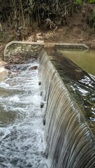 water flowing over the river