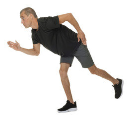 Man in sportswear running on white background