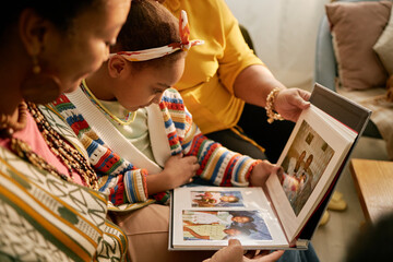 Family Sharing Photo Album and Cherishing Memories