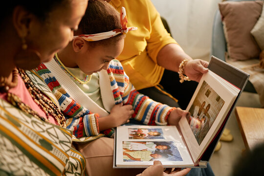 Family Sharing Photo Album and Cherishing Memories