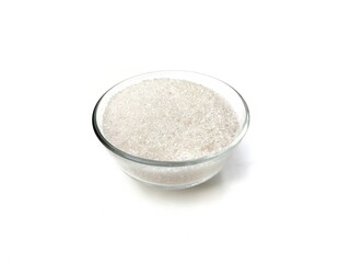 Sugar in bowl isolated on white background, food ingredient 