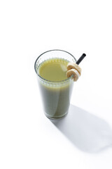 Green smoothie with spinach,banana, apple, and lemon isolated on white background