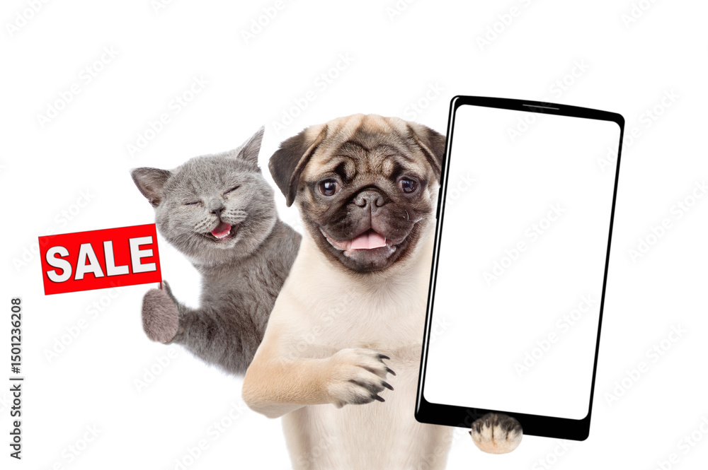 Aufkleber Funny Pug puppy holds big smartphone with white blank screen in it paw, showing close to camera. Happy cat showing signboard with labeled 