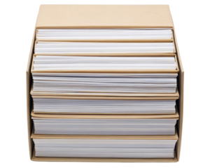 Cardboard box overflowing with stacks of white paper on a transparent background