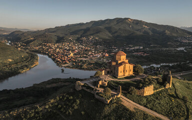 Aerial view of Jvari Monastery and Mtskheta at the confluence of rivers in Georgia © a_medvedkov