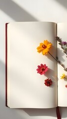 Vibrant Pressed Flowers Adorning Blank Notebook Pages 