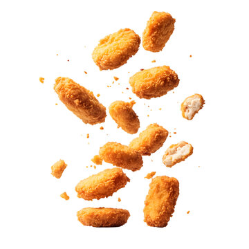 Crispy chicken nuggets falling isolated on transparent background