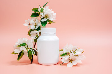 Jar with pills on pink background. Health concept. Medicine, pills, flu and cold, headache