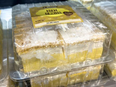 Delicious slovenian krem rezina cake in clear plastic packaging