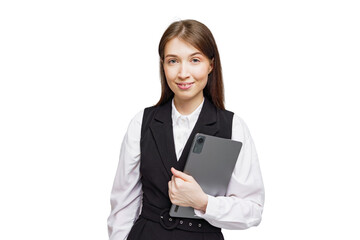 Confident woman in professional attire holds tablet while smiling in a bright and modern setting