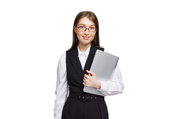 Confident young professional holding a laptop while smiling, ready for the workday ahead in a...