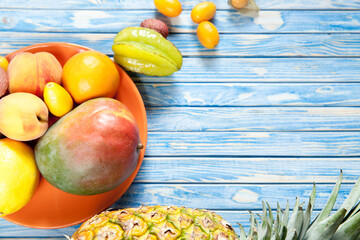 various fruits on a wooden background