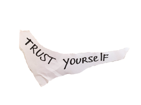 Torn white paper with motivational handwritten message Trust Yourself on transparent background