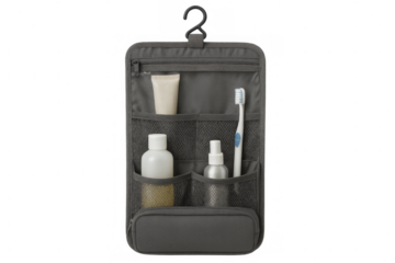 Open hanging toiletry bag revealing essential travel items, isolated on a transparent background