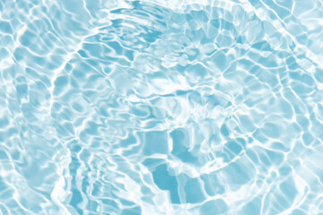 Blue water with ripples on the surface. Defocus blurred transparent blue colored clear calm water...