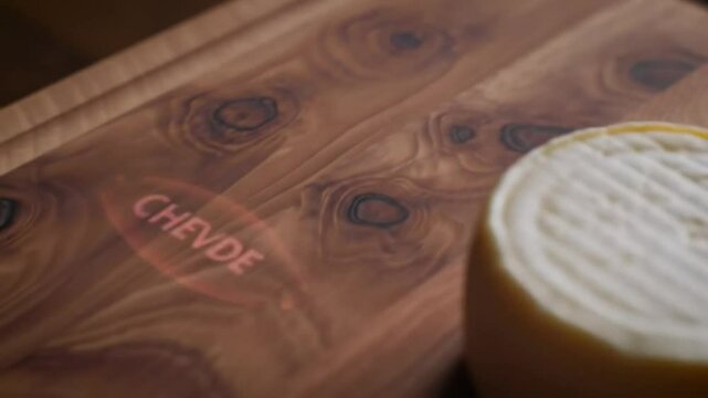 Gourmet Wooden Cheese Platter Presentation With A Selection Of Fine Cheeses
