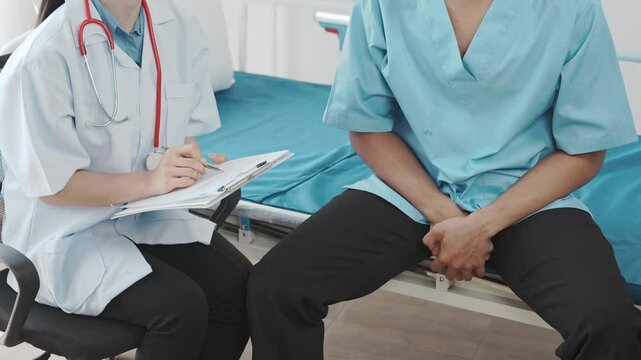 Doctors are providing counseling regarding prostate and venereal cancers that have been detected in a young man. Doctors provide advice and guidance on prostate cancer detection and appropriate treatm