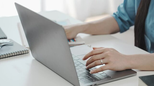 office girl's hands typing input data