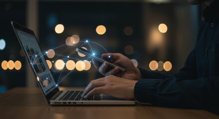 Person using laptop and smartphone with digital network overlay at night