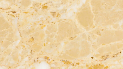 Close-up of a luxurious yellow marble surface with intricate veining