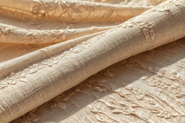 A detailed view of a piece of woven fabric with intricate patterns and textures