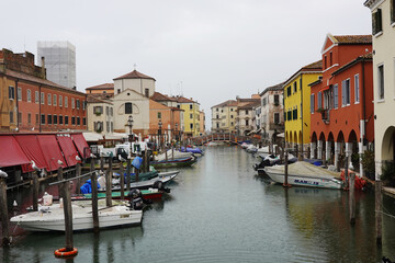 Obraz premium Old canals and streets in Chioggia, Italy