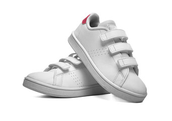 A pair of white children's sneakers with velcro straps and pink heel accents designed for casual...