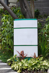 hotel signboard in a garden