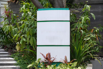 hotel signboard in a garden