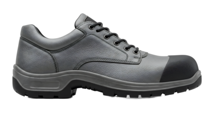 Gray work boot on dark surface