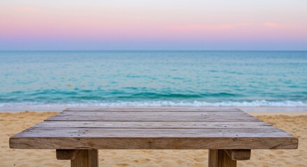 Photo of Wooden Table on Sandy Beach with Tranquil Ocean and Sky at Sunset