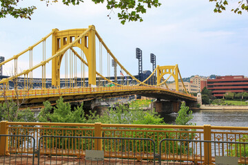 Captivating View of the Yellow Bridge Over the River in Pittsburgh with the Pirates Baseball Stadium in the Background