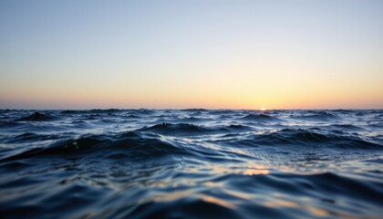Naklejka premium Sunset over ocean waves seaside nature photography serene environment wide-angle viewpoint tranquil concept