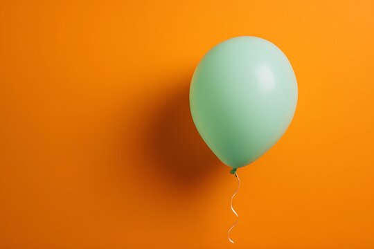 green balloon with orange background for designs 