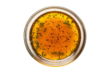 Top view of a small glass bowl filled with homemade herb vinaigrette dressing.  Perfect for salads, marinades, or dipping.