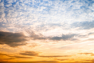 Beautiful , luxury soft gradient orange gold clouds and sunlight on the blue sky perfect for the background, take in evening,Twilight, Large size, high definition landscape photo