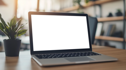 Minimalistic Workspace Featuring Laptop with Empty PNG Screen and Coffee Mug for Creative Advertising or Branding Concepts