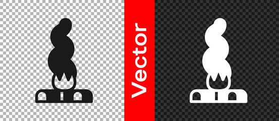 Black Campfire icon isolated on transparent background. Burning bonfire with wood. Vector