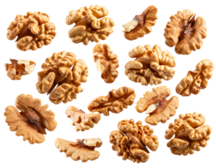 Top view of falling walnuts captured mid-air with motion blur isolated on transparent background PNG