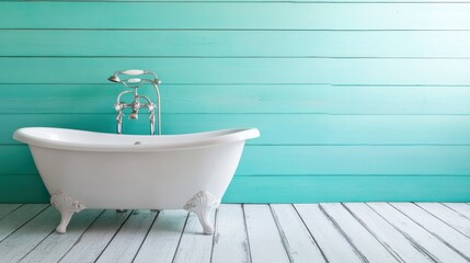 A classic white bathtub sitting gracefully against a soothing aqua wall in a beautifully lit space, evoking feelings of relaxation and serenity within the bathroom's atmosphere.