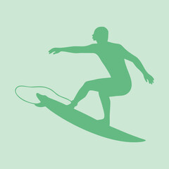 silhouette of a surfing athlete in action on the waves