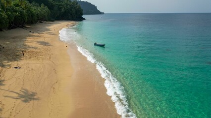 Aerial View of a Boat in Stunning Crystal Clear Waters of Principe Island, Africa