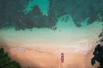 Aerial View of a Boat in Stunning Crystal Clear Waters of Principe Island, Africa