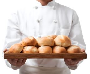 The baker presents a wooden tray filled with freshly baked golden-brown bread rolls.