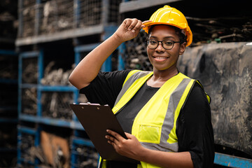 Happy Black African women engineer worker enjoy working in factory industry.