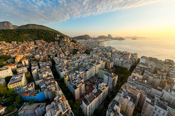 Aerial View of Cantagalo Slum and Copacabana District Below on Sunrise in Rio de Janeiro, Brazil