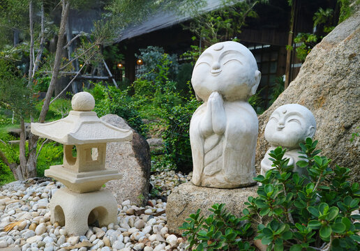 Japanese Style Garden with Stone Lantern and Jizo Statues