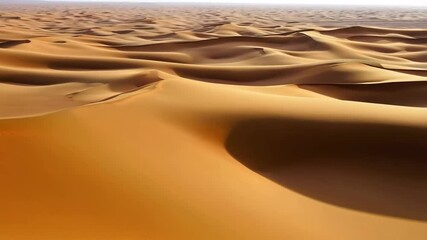 Endless golden sand dunes stretch to the horizon in an arid desert landscape, creating abstract wave patterns and sunlit textures. - Powered by Adobe
