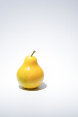 Single Bright Yellow Pear Studio Shot
