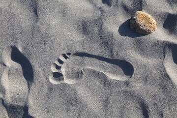 Beach sand footprint in Sardinia, Italy